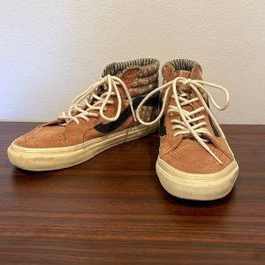 Tan and floral hightop vans